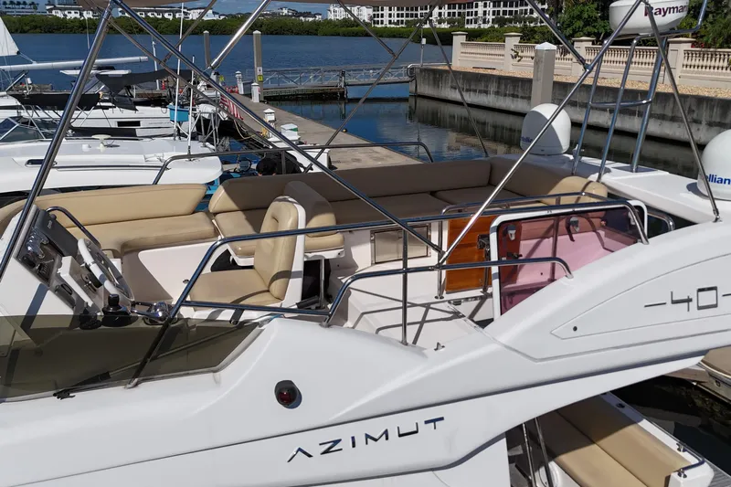  Yacht Photos Pics 2012 Azimut 40 FLY yacht docked, featuring spacious seating and sleek design.