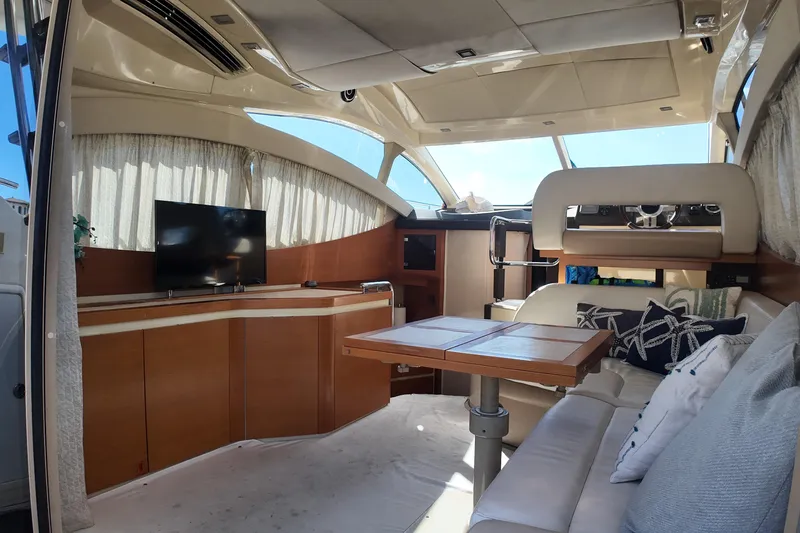 Yacht Photos Pics Luxurious interior of 2012 Azimut 40 FLY yacht with modern furnishings and entertainment system.