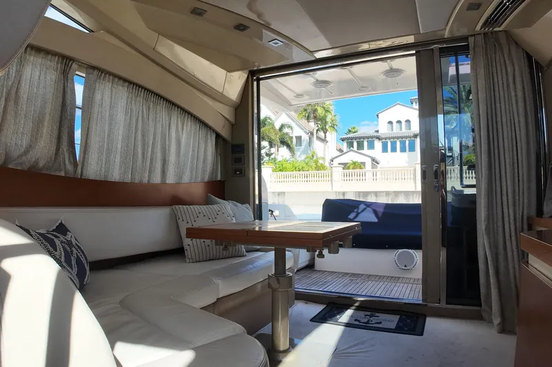  Yacht Photos Pics Luxurious interior of 2012 Azimut 40 FLY yacht with elegant seating and table.