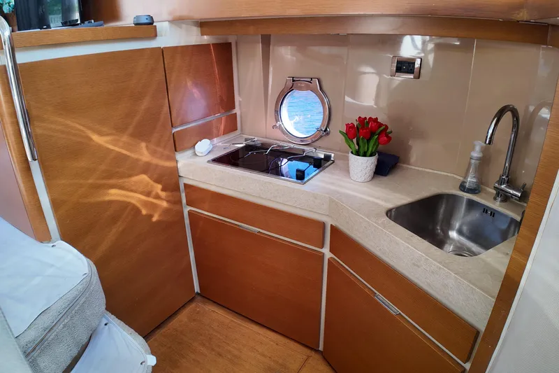  Yacht Photos Pics Luxurious 2012 Azimut 40 FLY yacht kitchen with modern amenities and elegant design.