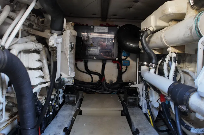  Yacht Photos Pics Engine room of a 2012 Azimut 40 FLY yacht, showcasing mechanical components and wiring.