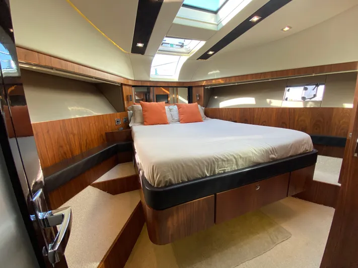 Coco Yacht Photos Pics Luxurious cabin interior of 2012 Fairline Squadron 65 yacht with skylight and modern design.