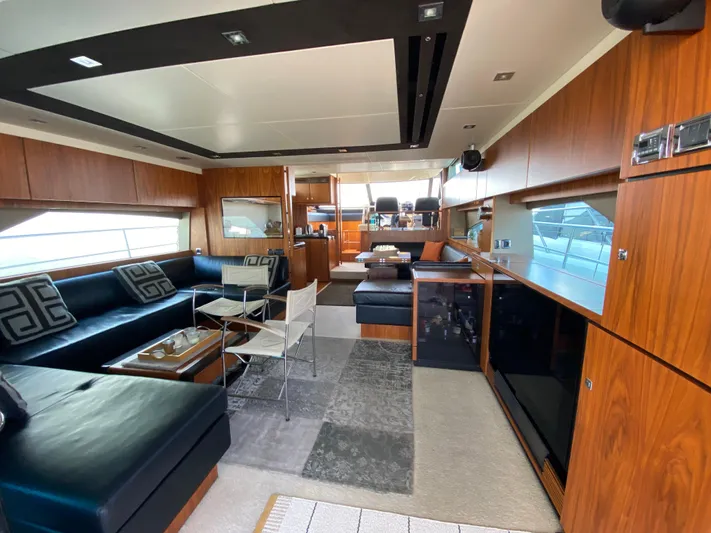 Coco Yacht Photos Pics Luxurious interior of 2012 Fairline Squadron 65 yacht with modern furnishings and elegant design.