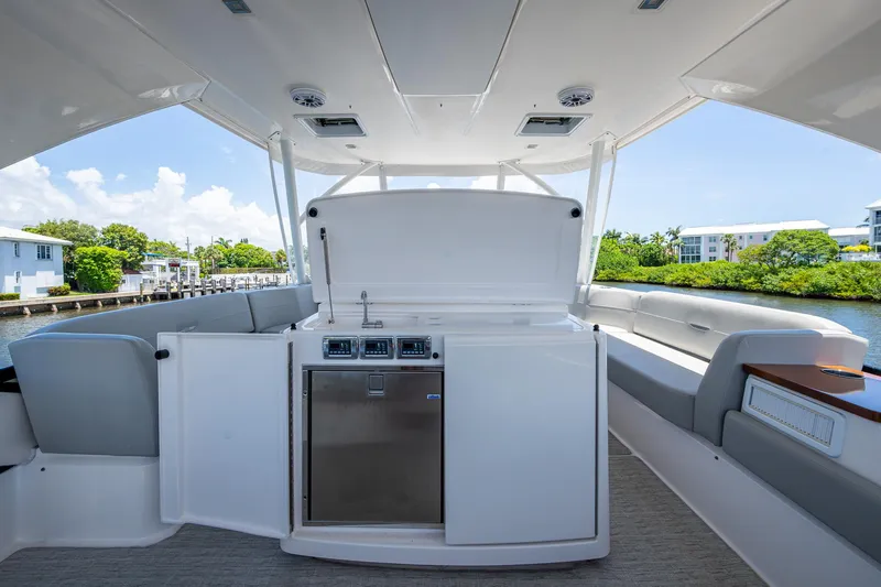 Hwyl Fawr Yacht Photos Pics 2018 Tiara Yachts F53 Flybridge interior with sleek design and modern amenities.