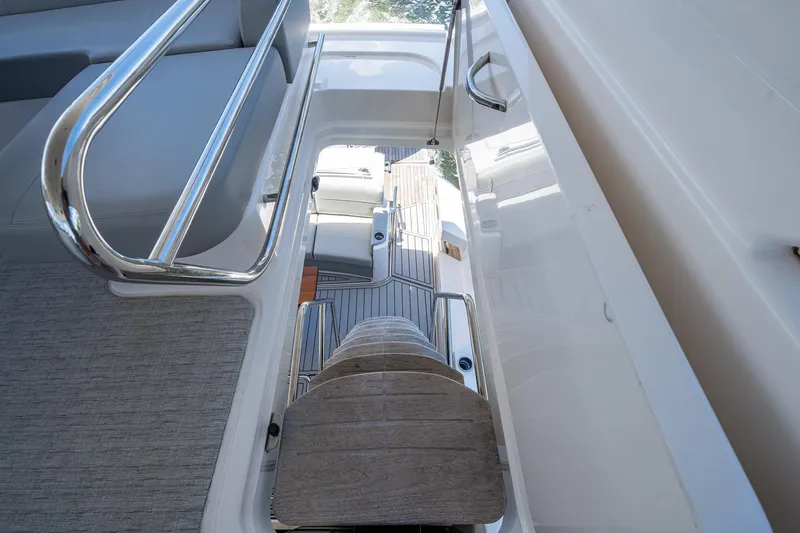 Hwyl Fawr Yacht Photos Pics 2018 Tiara Yachts F53 Flybridge deck with sleek design and modern features.