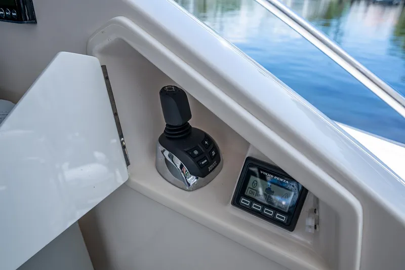 Hwyl Fawr Yacht Photos Pics 2018 Tiara Yachts F53 Flybridge control panel with joystick and display.