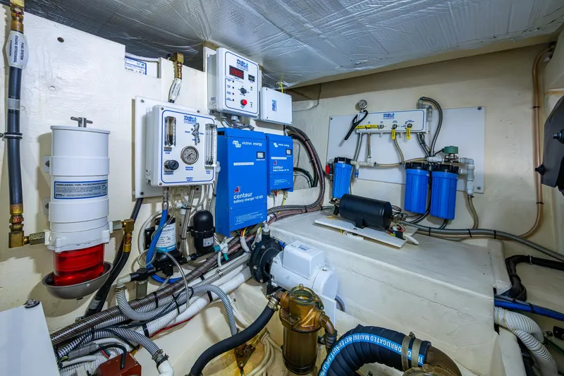 Hwyl Fawr Yacht Photos Pics Engine room of 2018 Tiara Yachts F53 Flybridge with advanced control systems and filtration units.