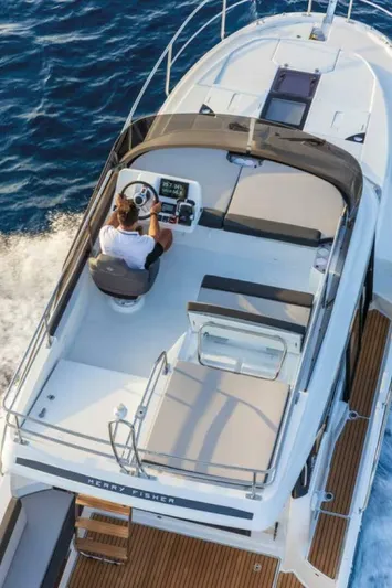  Yacht Photos Pics 2025 Jeanneau NC 1095 Fly cruising on open water, top view of flybridge.