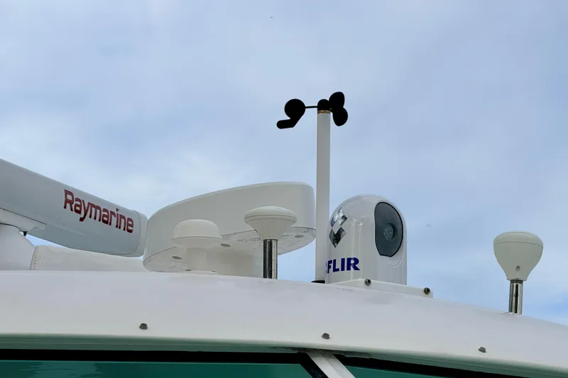 Moana Here Yacht Photos Pics Radar and FLIR systems on 2015 Albemarle 360 Express Fisherman boat under cloudy sky.