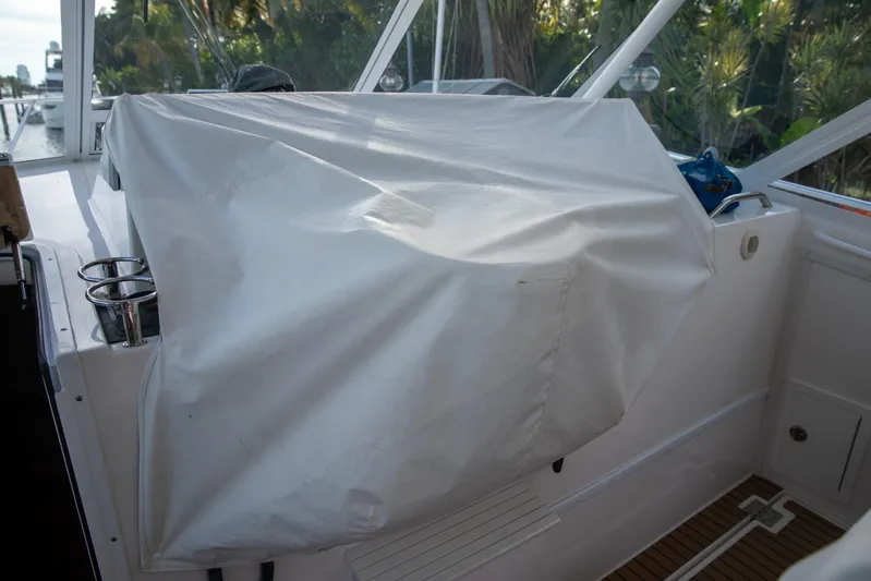 Moana Here Yacht Photos Pics Covered helm area of a 2015 Albemarle 360 Express Fisherman boat.