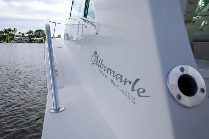 Moana Here Yacht Photos Pics 2015 Albemarle 360 Express Fisherman boat on calm water, showcasing sleek design.