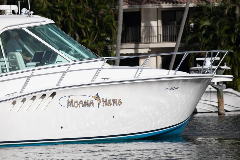 Moana Here Yacht Photos Pics 2015 Albemarle 360 Express Fisherman boat on water, side view with custom name.