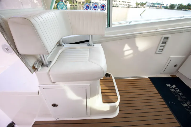 Moana Here Yacht Photos Pics 2015 Albemarle 360 Express Fisherman interior with white seating and wooden flooring.