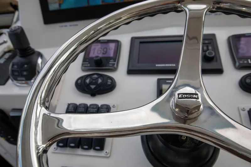 Moana Here Yacht Photos Pics Steering wheel and controls of 2015 Albemarle 360 Express Fisherman boat.