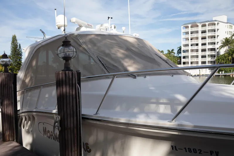 Moana Here Yacht Photos Pics 2015 Albemarle 360 Express Fisherman docked near waterfront buildings.