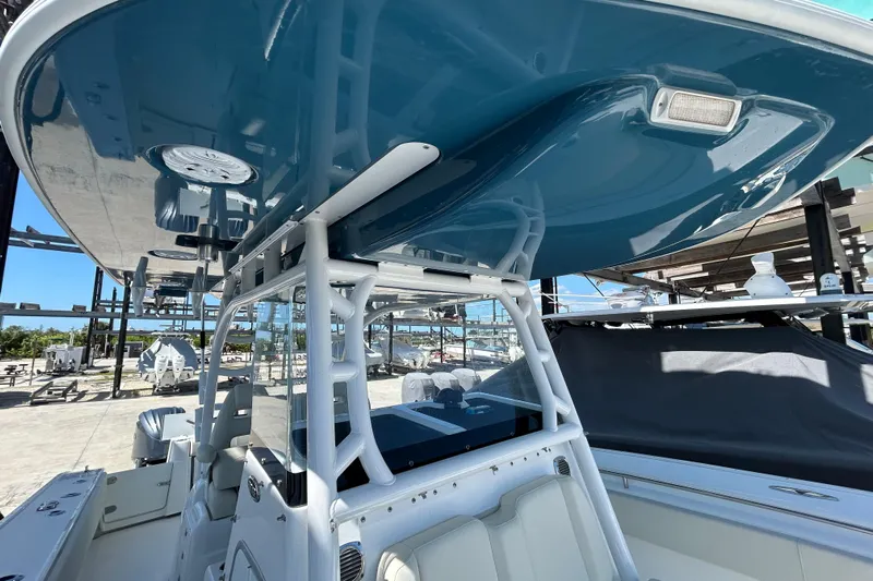  Yacht Photos Pics 2022 Cape Horn 36 boat with sleek blue canopy and modern design.