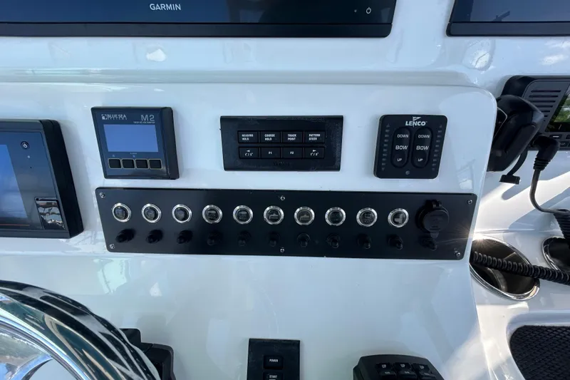 Yacht Photos Pics Control panel of a 2022 Cape Horn 36 boat with various switches and displays.