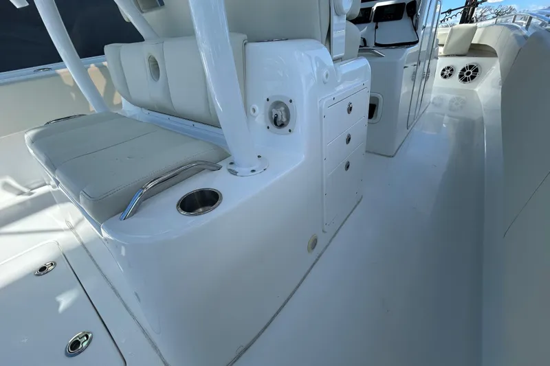  Yacht Photos Pics 2022 Cape Horn 36 boat interior with white seating and storage compartments.