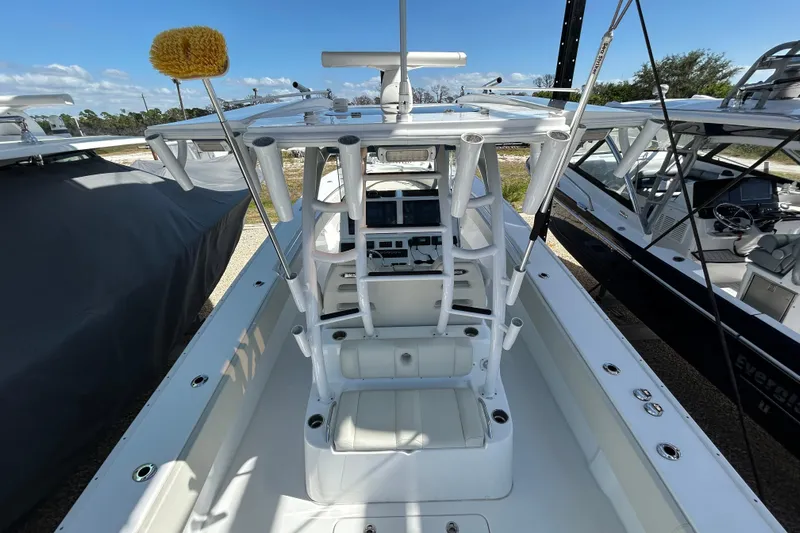  Yacht Photos Pics 2022 Cape Horn 36 boat interior with helm station and seating, docked outdoors.
