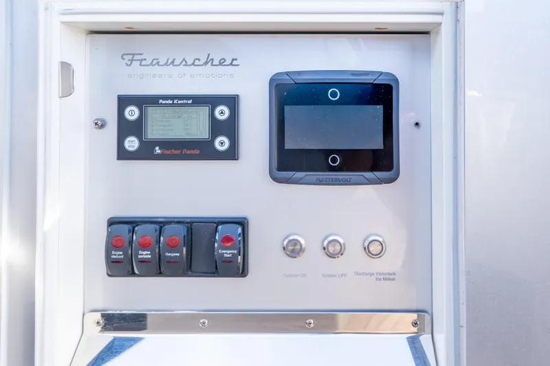 Acdc Yacht Photos Pics Control panel of 2019 Frauscher 1414 Demon Air with switches and display.