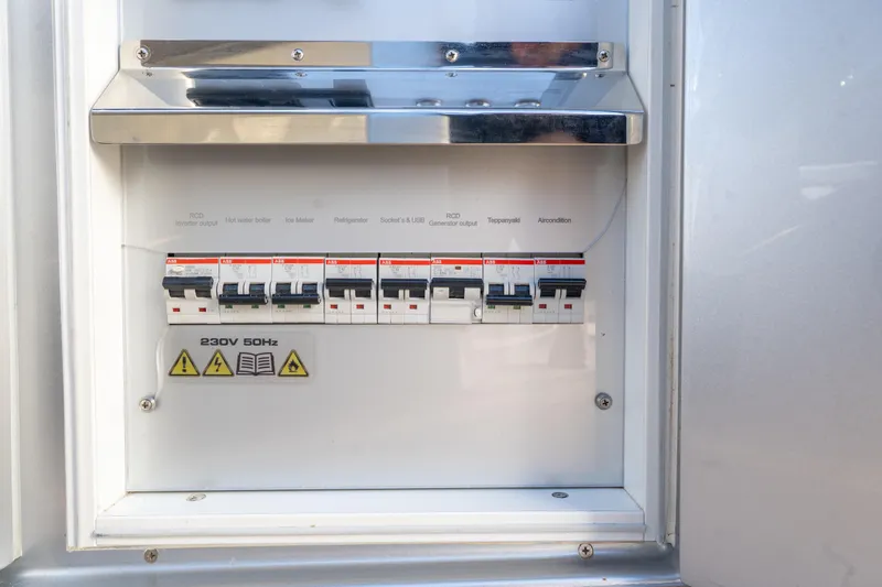 Acdc Yacht Photos Pics Electrical panel on 2019 Frauscher 1414 Demon Air boat, showing circuit breakers.