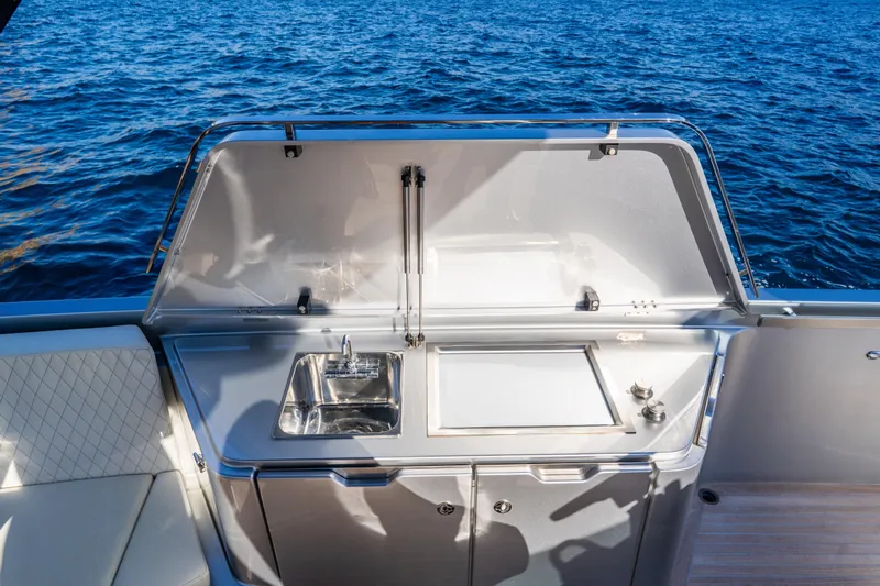 Acdc Yacht Photos Pics 2019 Frauscher 1414 Demon Air yacht with outdoor kitchen and sink by the sea.