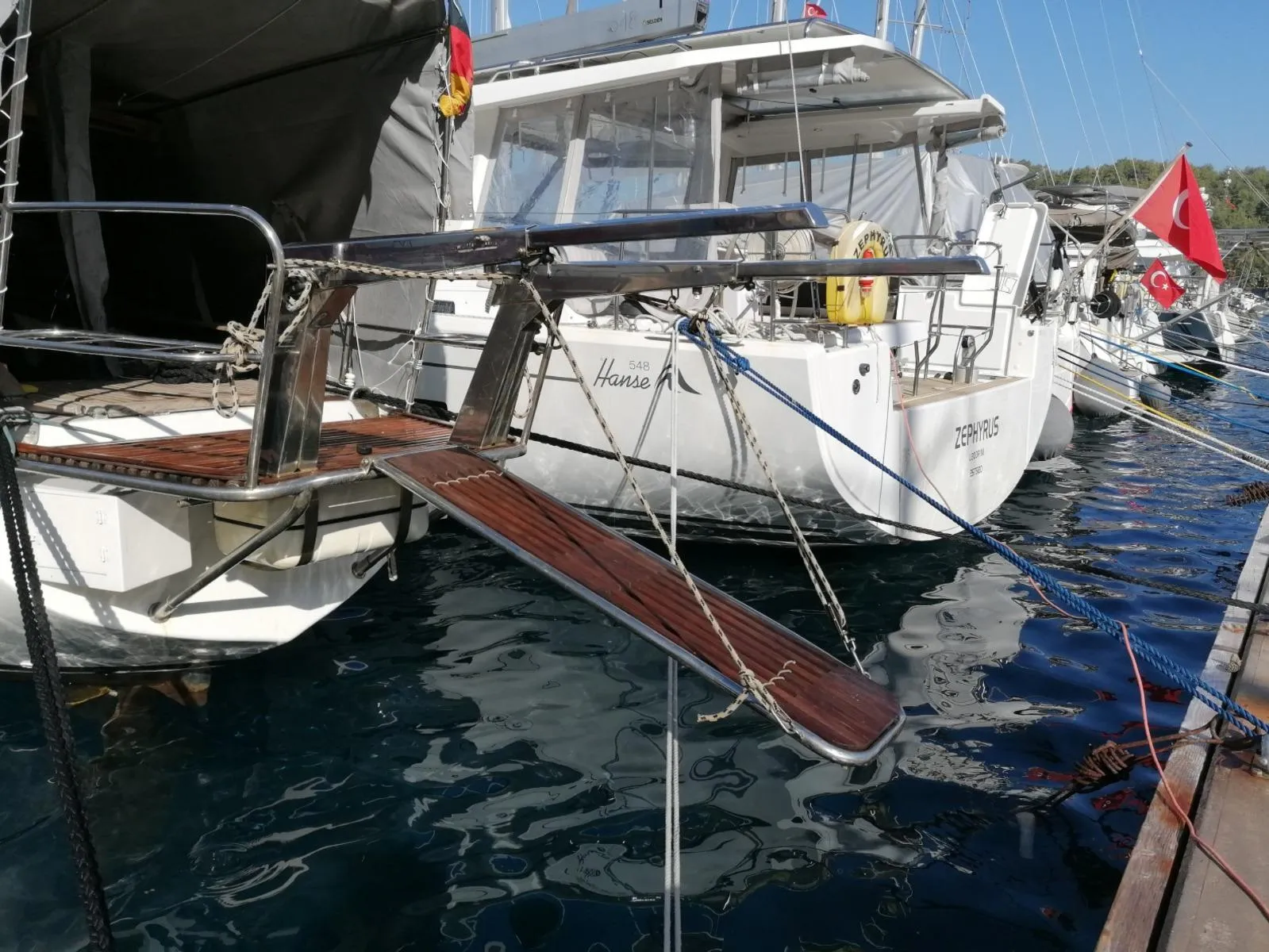 1973 Sloop Beaufort 14 Bluewater Cruiser docked with gangway extended.