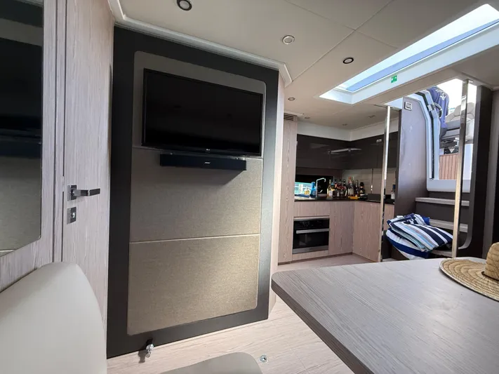 Relax Josephine Yacht Photos Pics Interior of 2022 Azimut Atlantis 45 yacht, featuring modern kitchen and entertainment area.