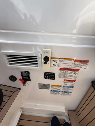 Relax Josephine Yacht Photos Pics Control panel and safety warnings on a 2022 Azimut Atlantis 45 yacht.