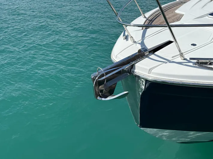 Relax Josephine Yacht Photos Pics Azimut Atlantis 45 yacht bow with anchor, 2022 model, on turquoise water.
