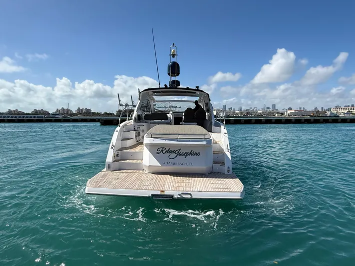 Relax Josephine Yacht Photos Pics Azimut Atlantis 45 yacht, 2022 model, cruising on clear blue water under a sunny sky.