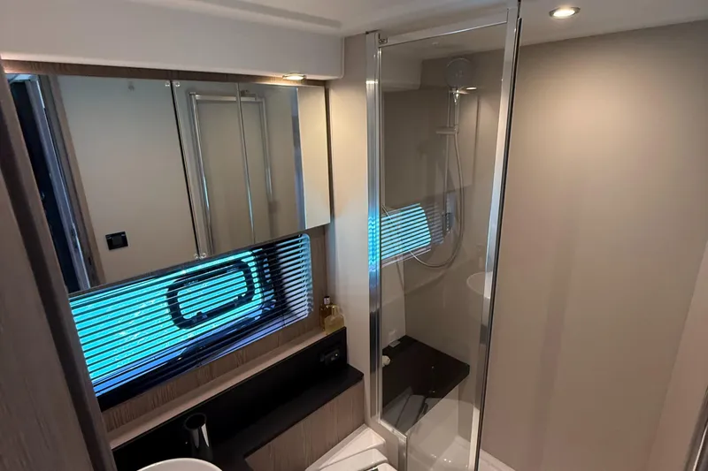 Relax Josephine Yacht Photos Pics Bathroom interior of 2022 Azimut Atlantis 45 yacht with modern shower and sleek design.