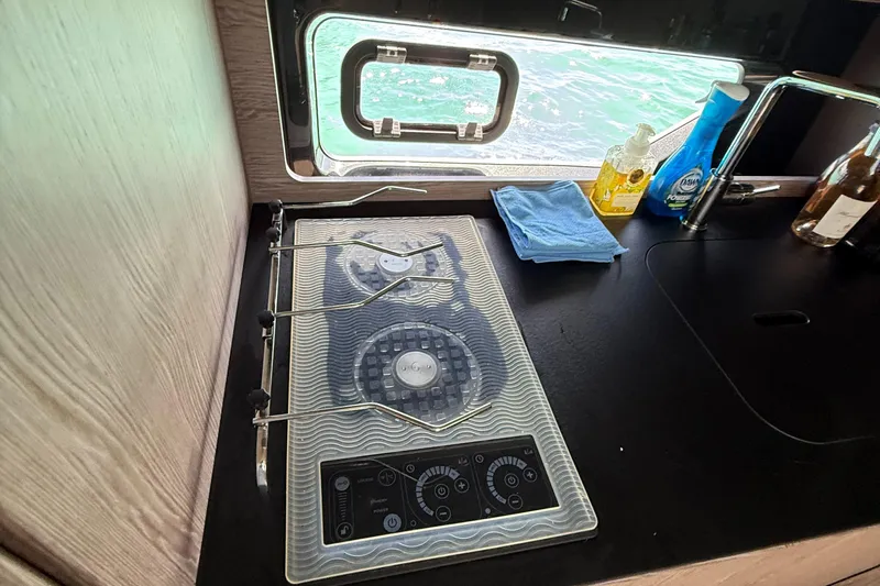 Relax Josephine Yacht Photos Pics Modern kitchen in 2022 Azimut Atlantis 45 yacht with stove and sink.