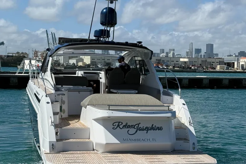 Relax Josephine Yacht Photos Pics Azimut Atlantis 45 yacht, 2022 model, docked in Miami Beach with city skyline.