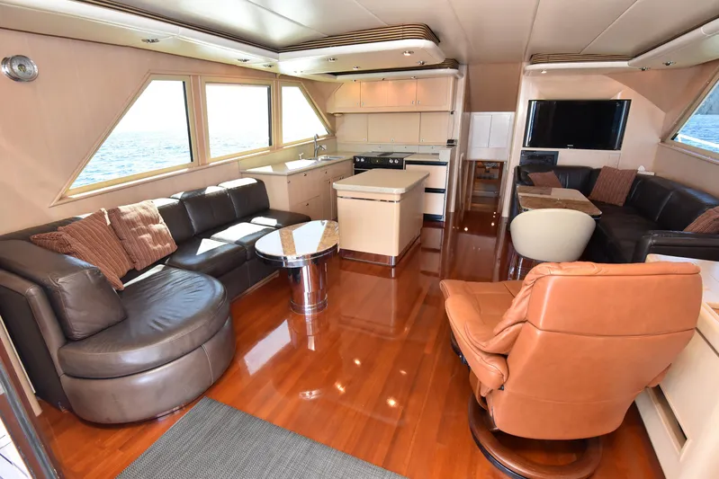 Talisman Yacht Photos Pics Luxurious interior of a 1989 Striker 62 Convertible yacht.