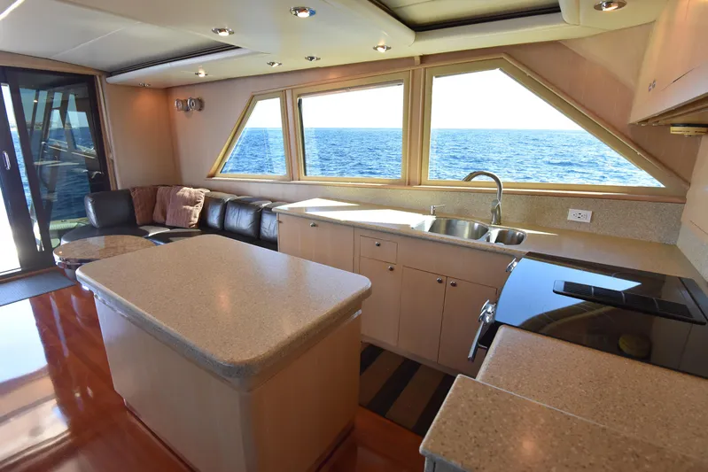 Talisman Yacht Photos Pics Interior of 1989 Striker 62 Convertible yacht with ocean view.