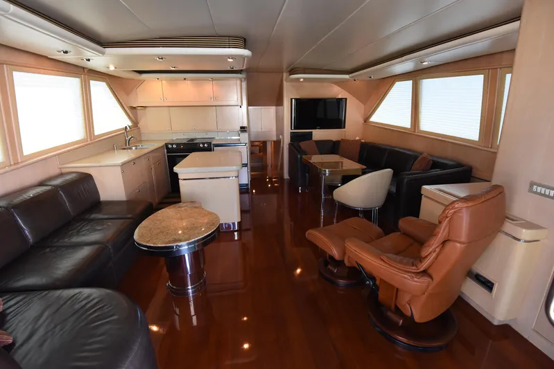 Talisman Yacht Photos Pics Luxurious interior of a 1989 Striker 62 Convertible yacht.