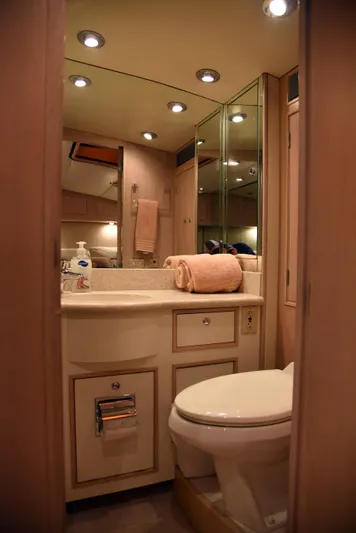 Talisman Yacht Photos Pics Luxurious bathroom in 1989 Striker 62 Convertible yacht.