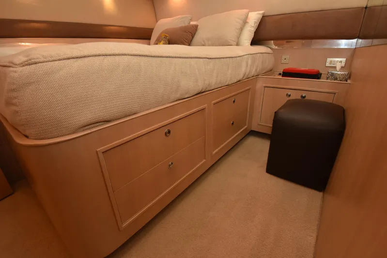 Talisman Yacht Photos Pics Luxurious bedroom in Striker 62 Convertible yacht, 1989 model.