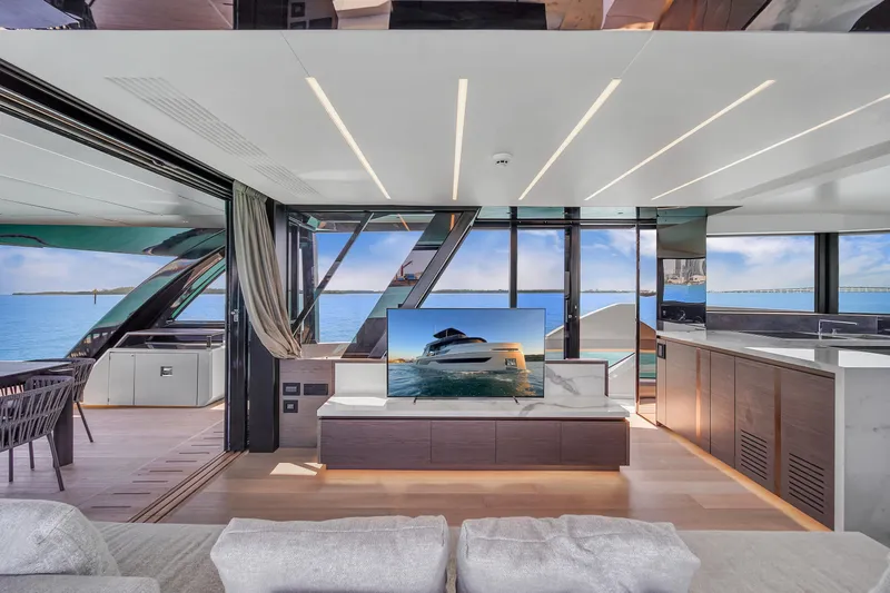  Yacht Photos Pics Luxurious interior of 2021 Explorer 62 yacht with modern design and ocean view.