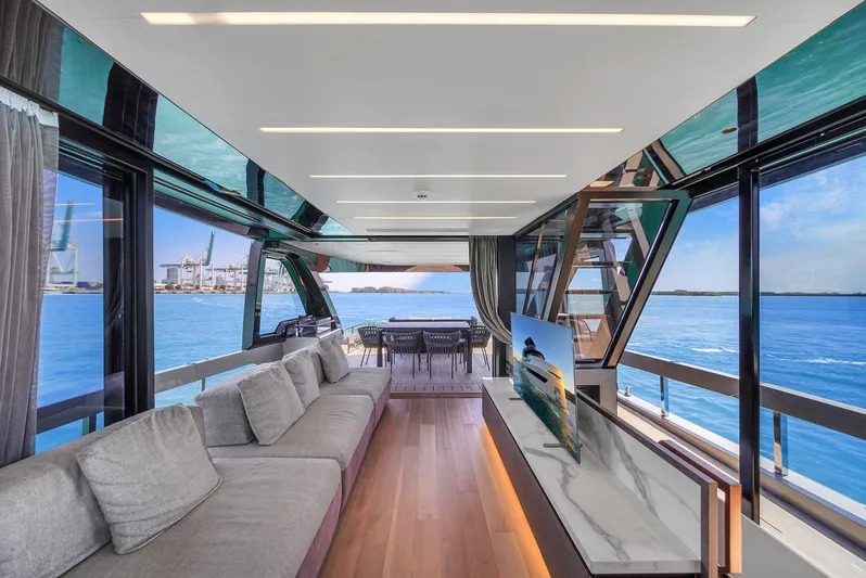  Yacht Photos Pics Luxurious interior of 2021 Explorer 62 yacht with ocean view and modern furnishings.