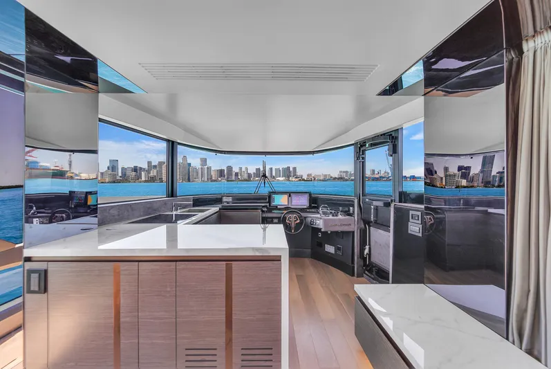  Yacht Photos Pics Luxurious 2021 Explorer 62 yacht interior with panoramic city skyline view.