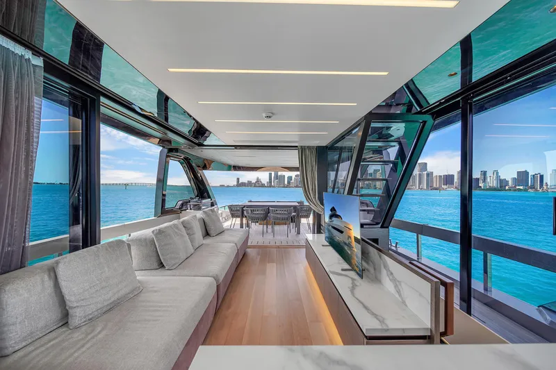  Yacht Photos Pics Luxurious 2021 Explorer 62 yacht interior with panoramic ocean views and modern furnishings.