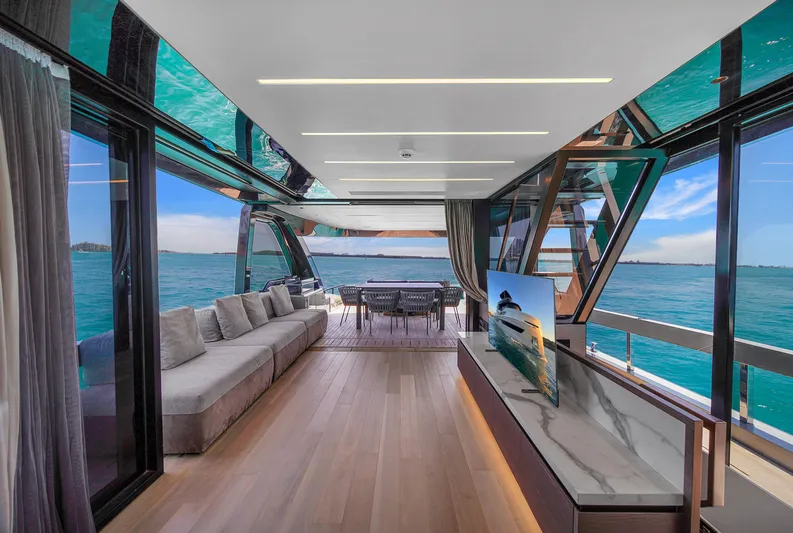  Yacht Photos Pics Luxurious interior of 2021 Explorer 62 yacht with ocean view and modern furnishings.