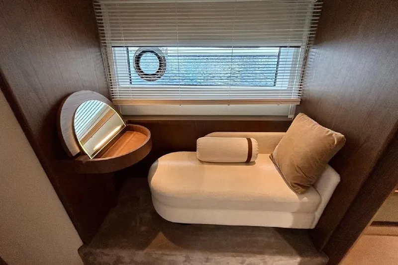  Yacht Photos Pics Luxurious interior of 2024 Azimut Fly 72 yacht with elegant chaise lounge and vanity.