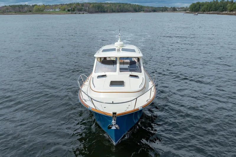 The Do-over Yacht Photos Pics 2024 Hinckley Picnic Boat 40 cruising on calm waters, front view.
