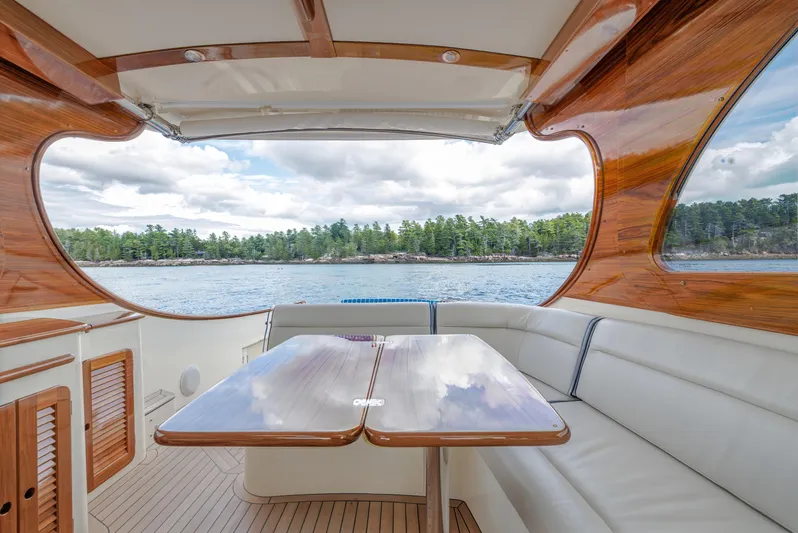 The Do-over Yacht Photos Pics 2024 Hinckley Picnic Boat 40 interior with elegant wood finish and scenic water view.