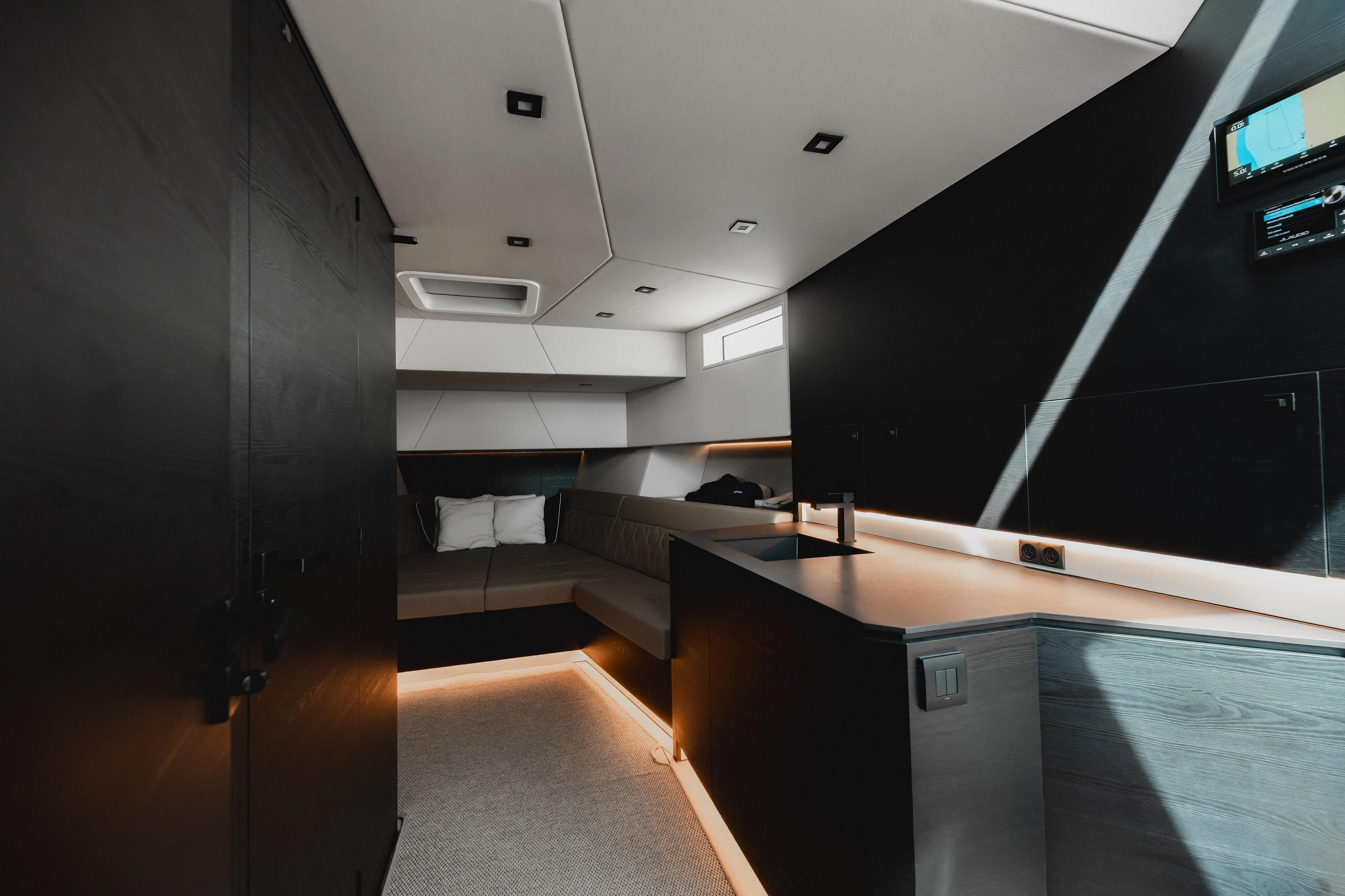 Shir Yacht Photos Pics Luxurious interior of 2024 Vanquish 58 yacht with modern design and ambient lighting.