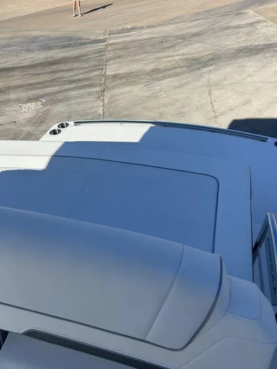 Only A Formula Yacht Photos Pics 2025 Formula 310 Bowrider boat on a concrete surface, partial view.