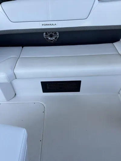 Only A Formula Yacht Photos Pics 2025 Formula 310 Bowrider interior seating with sleek white upholstery.